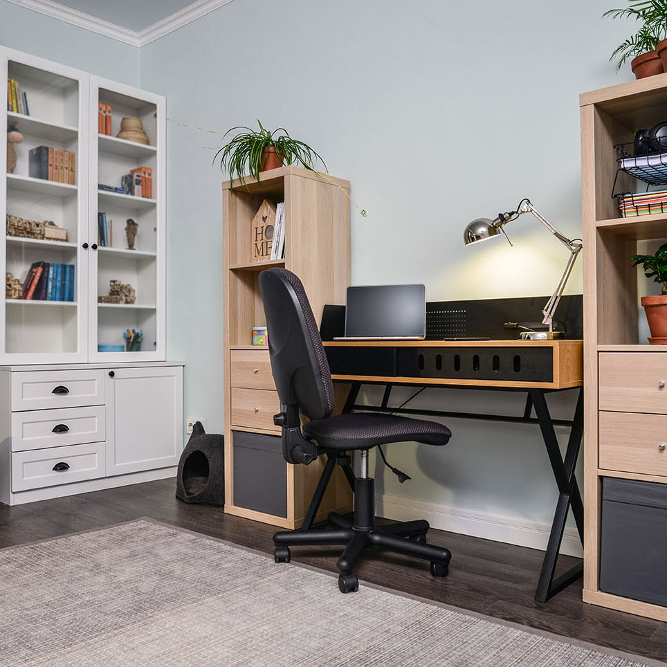 Light cozy teen room with white bookcases